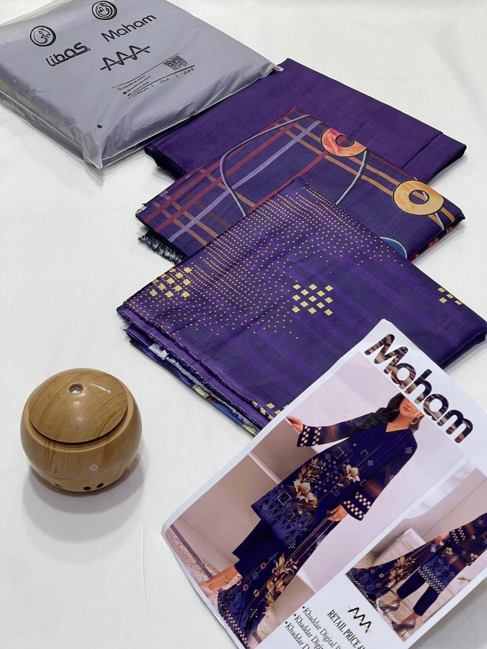 Purple fabric set with geometric patterns and golden dots, Maham brand packaging and design catalog