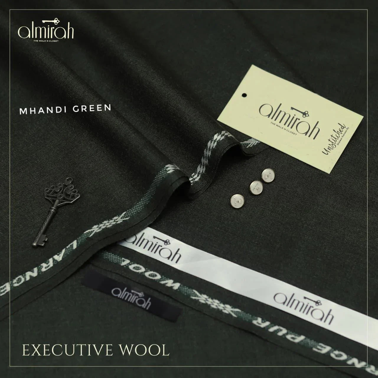 Almirah executive wool fabric in Mhindi green with fabric labels, buttons, and a decorative key