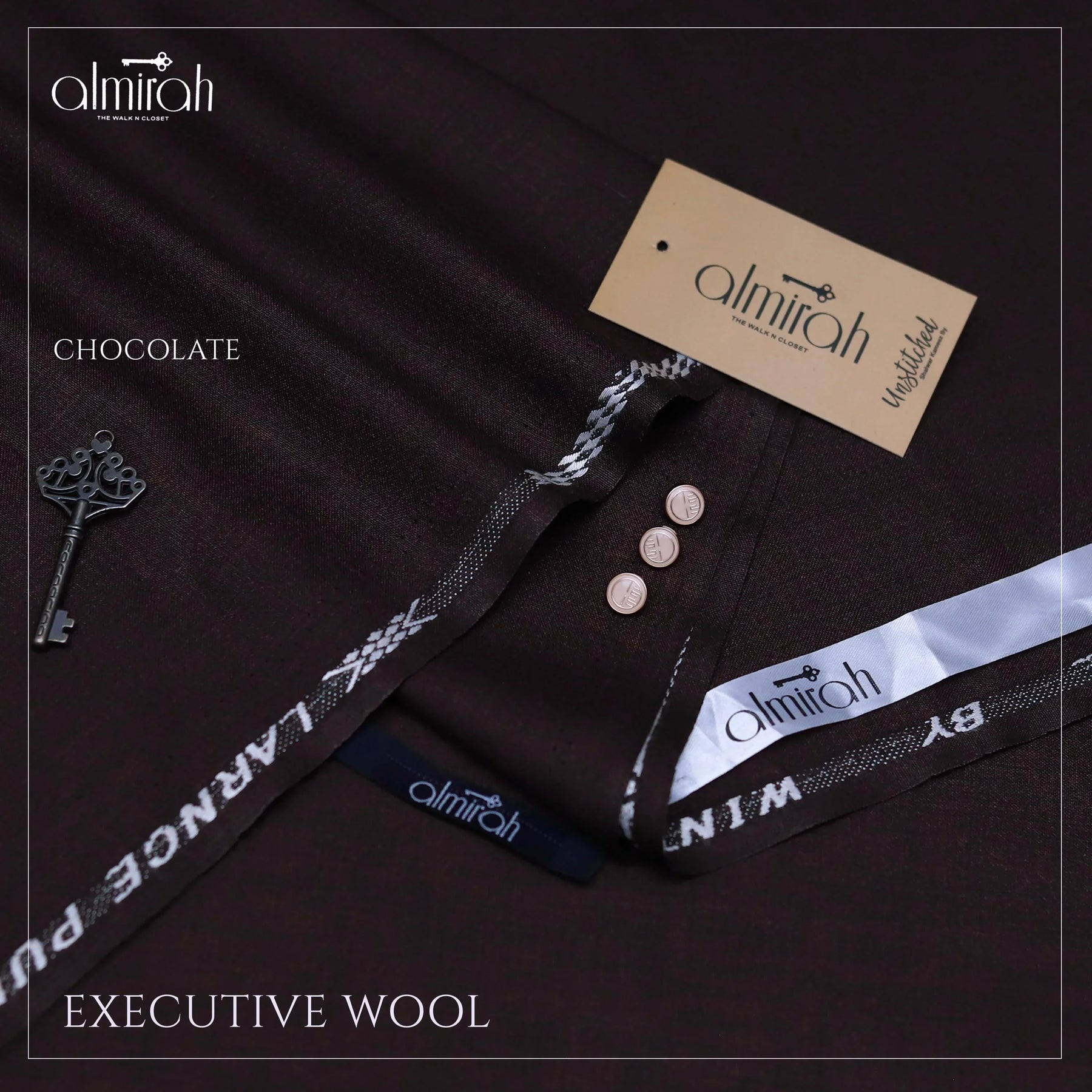 Chocolate brown executive wool fabric with Almirah brand tags and buttons displayed