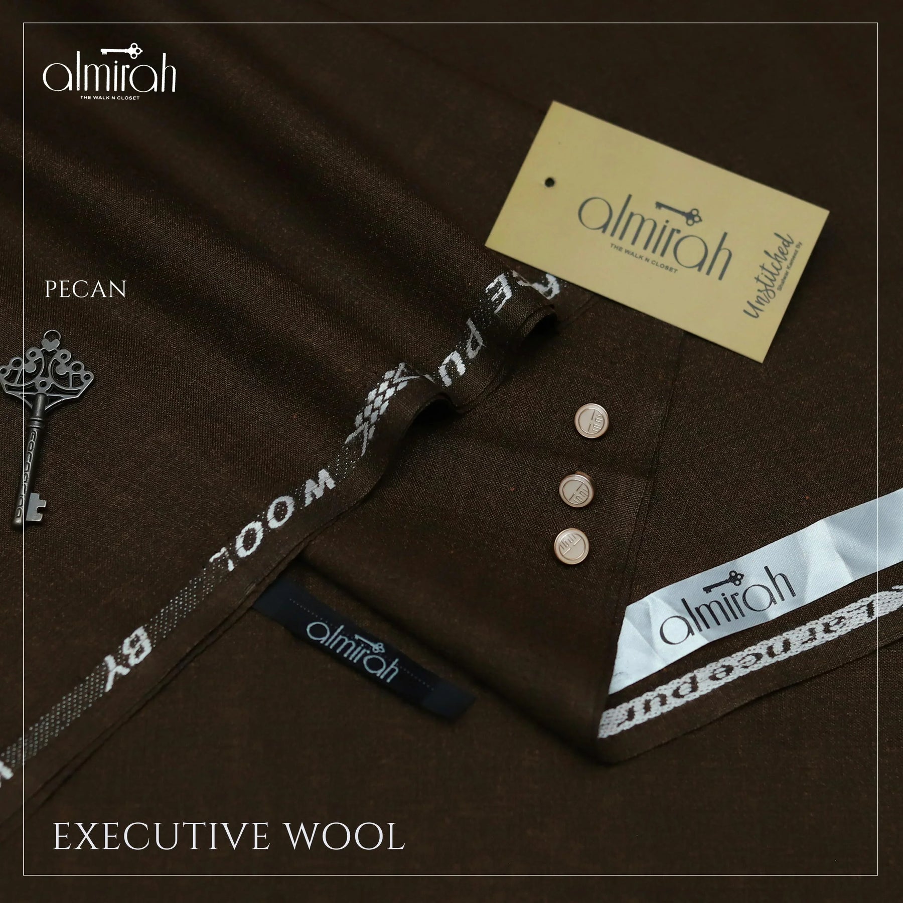 Pecan colored executive wool fabric with Almirah brand labels and buttons, showcasing unstitched material